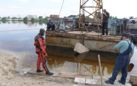 Відновлення бетонної поверхні та антикорозійного покриття металу в зоні змінного рівня води